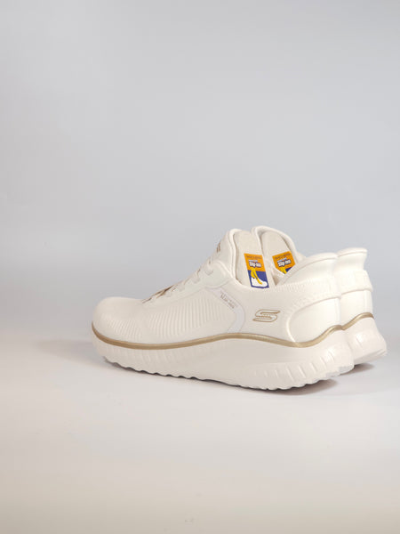 SKECHERS - SCARPA DA GINNASTICA BIANCA E DORATA CON TESSUTO ELASTICIZZATO SLIP INS SENZA USARE LE MANI CON MEMORY FOAM PER DONNA 117497