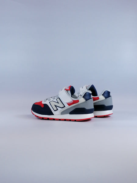 NEW BALANCE - SCARPA DA GINNASTICA 996 PER BAMBINI BIANCA ROSSA E BLU CON STRAPPO XE3